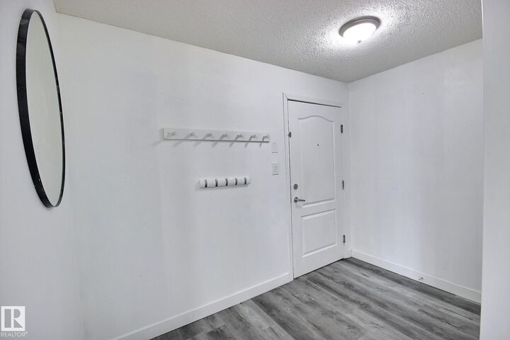Property Photo:  111 Edwards Drive SW 222  AB T6X 0C4 