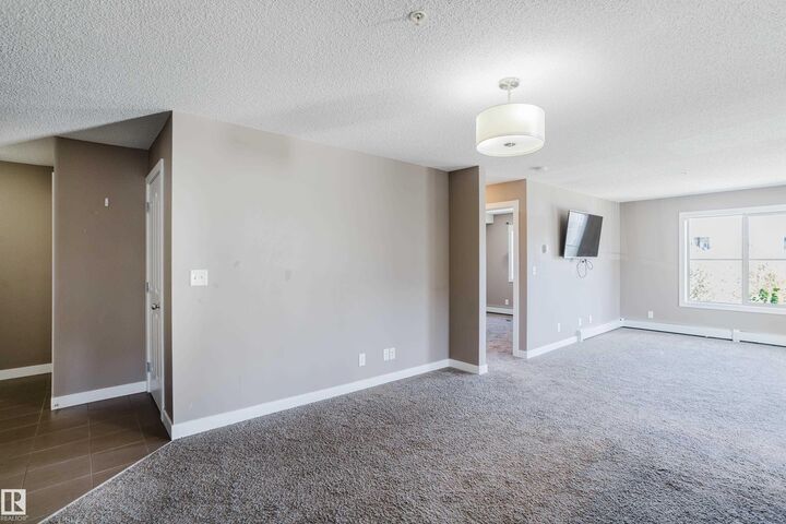 Property Photo: 11820 22 Avenue SW 301 AB T6W 2A2
