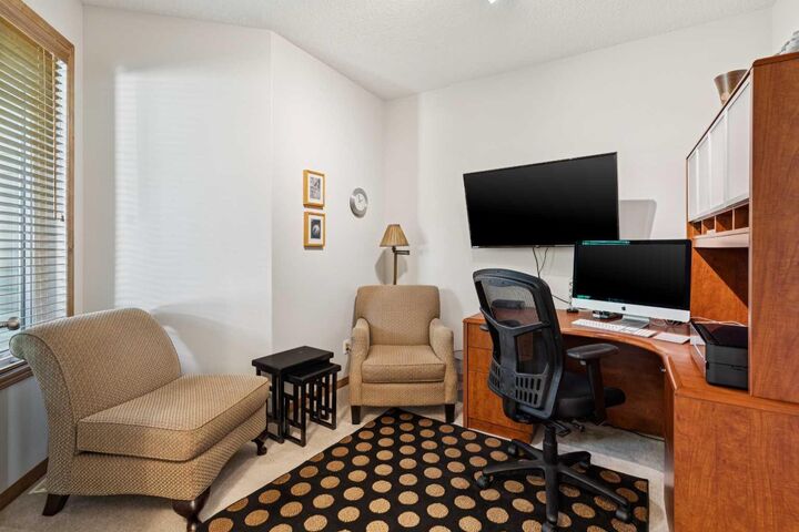 Property Photo:  511 Rocky Ridge Drive NW  AB T3G 5C3 
