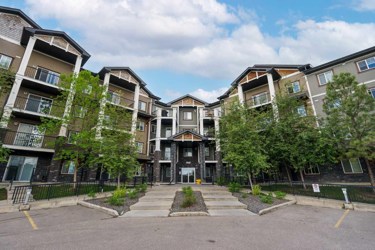 Property Photo:  130 Panatella Street NW 1113  AB T3K 0Y6 
