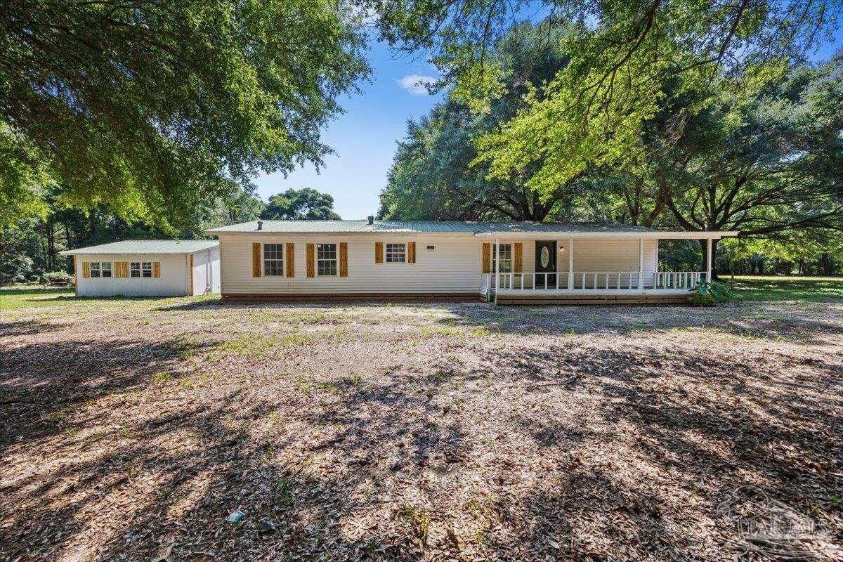 Property Photo:  12400 Wildlife Rd  FL 32564 