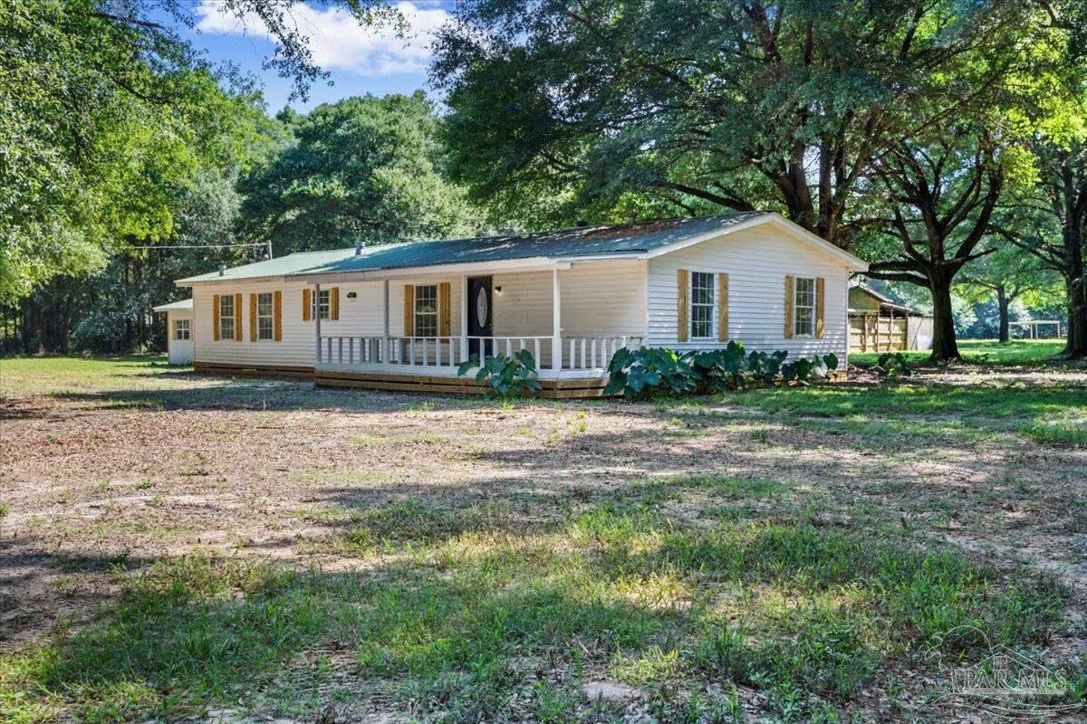 Property Photo:  12400 Wildlife Rd  FL 32564 
