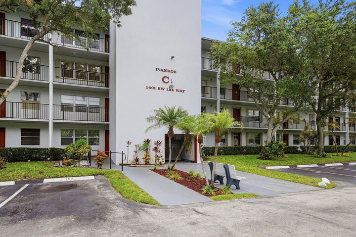Property Photo:  1401 SW 134th Way 410C  FL 33027 