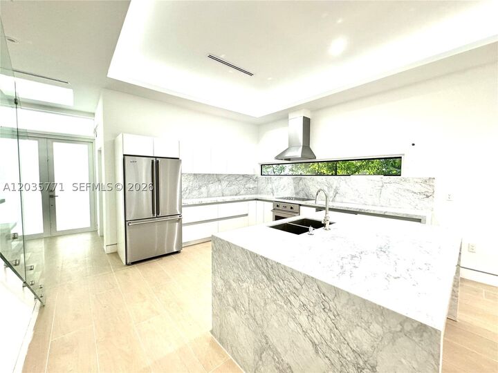 Property Photo: 5728 NW 5th Ct Th-1 FL 33127