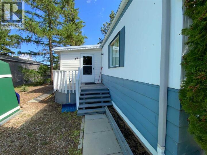 Property Photo:  48 Mobile Drive Northeast  AB T0M 2A0 