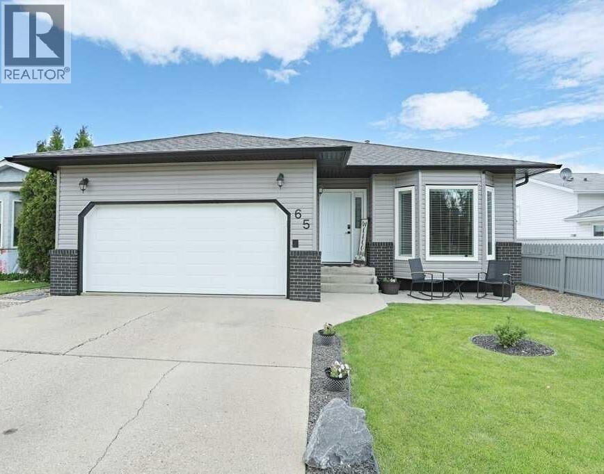 Property Photo: 65 Parkland Way East AB T1R 0M6