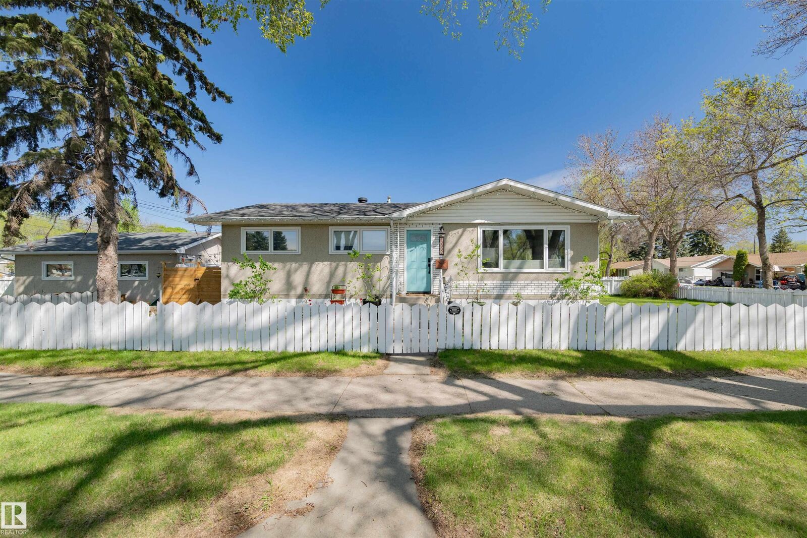 Property Photo: 12002 39 Street NW AB T5W 2J8