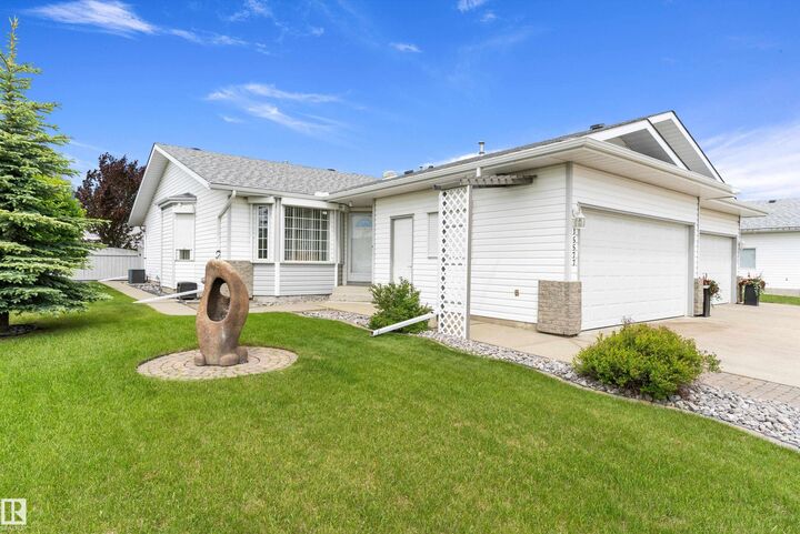 Property Photo: 15577 59A Street NW AB T5Y 2M8
