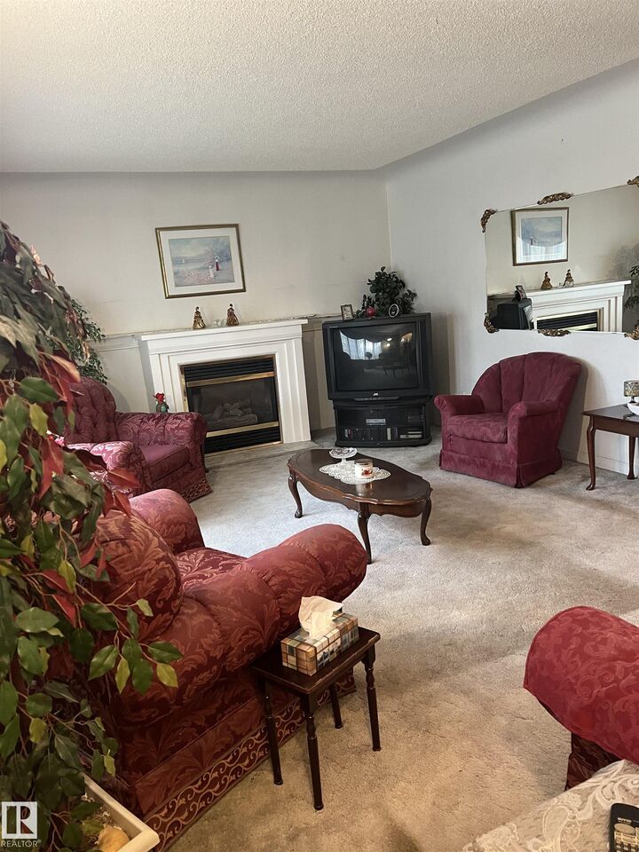 Property Photo:  10912 132 Street NW  AB T5M 1B4 