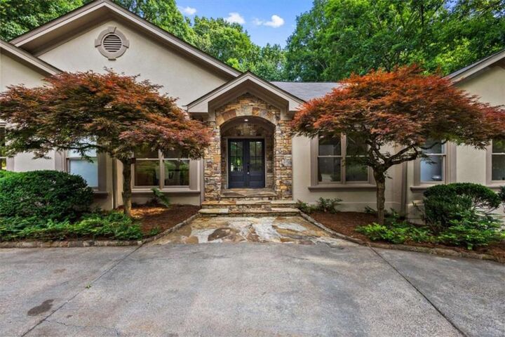 Property Photo:  8920 Huntcliff Trce  GA 30350 