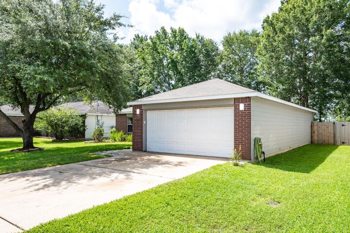Property Photo: 16392 Many Trees Lane TX 77302