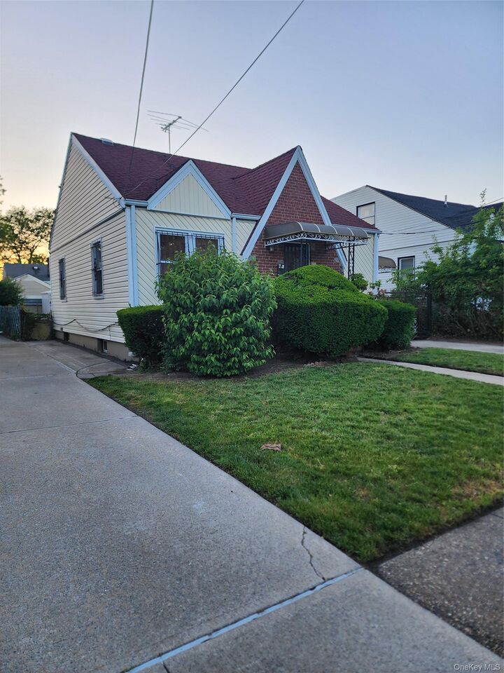 Property Photo:  11942 238th Street  NY 11411 