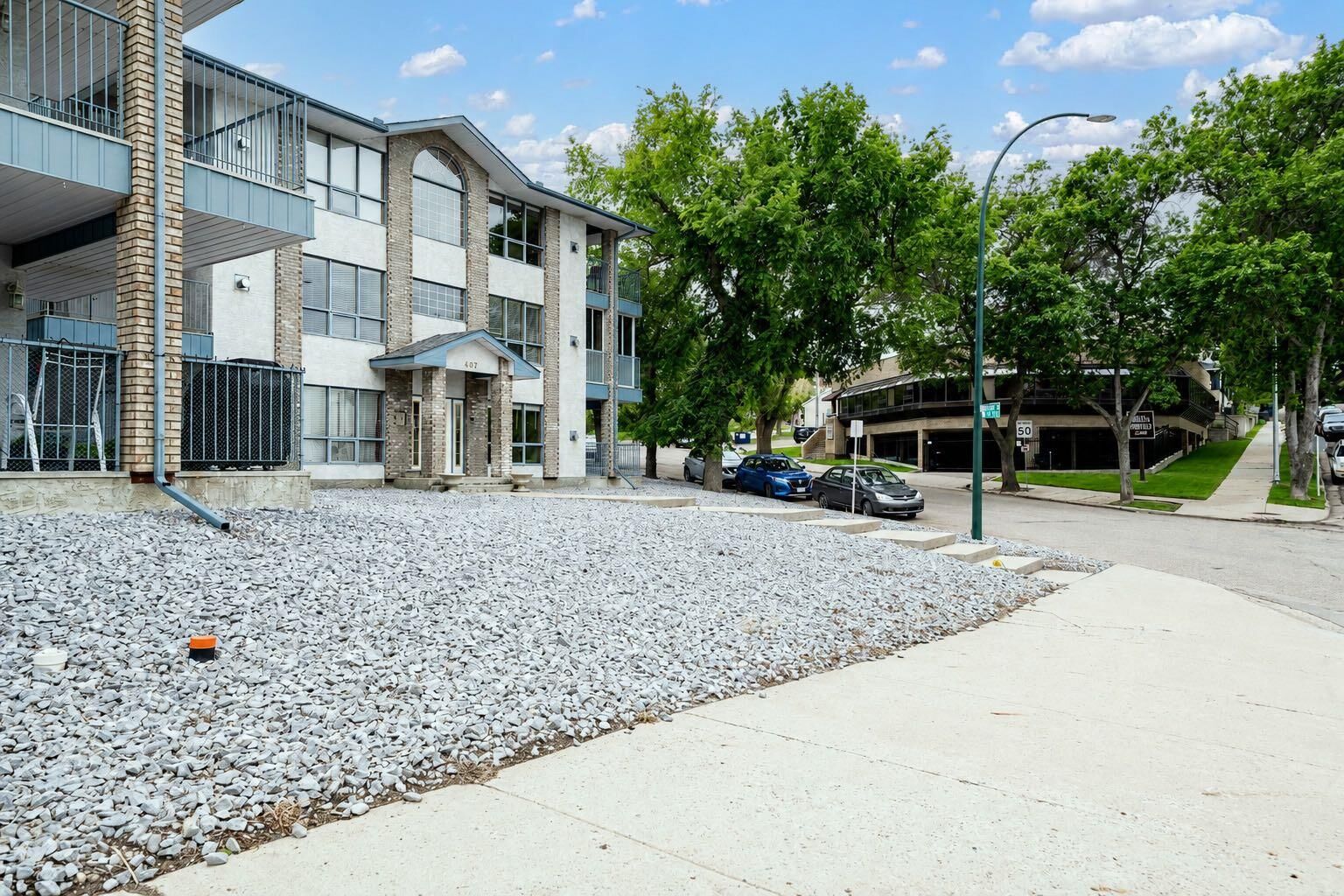 Property Photo:  407 Macleod Trail SE 4  AB T1A 8P7 