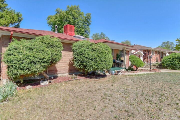 Property Photo: 7477 Canosa Court CO 80030