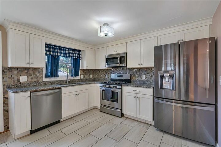 Property Photo:  83 Valente Drive  RI 02920 