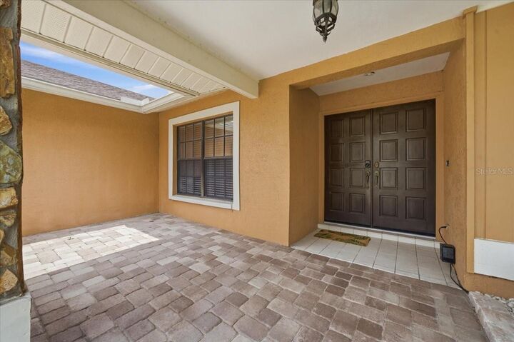 Property Photo:  11803 Sweetpea Court  FL 33635 