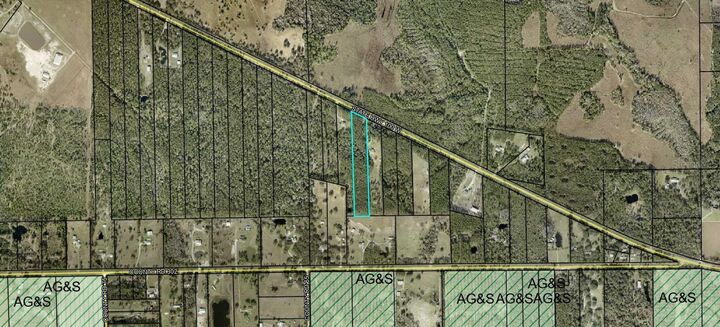 Property Photo: 4297 W Highway 100 FL 32110