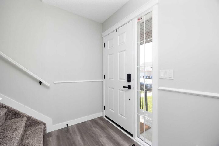 Property Photo: 134 Rattlepan Creek Crescent AB T9K 2V3