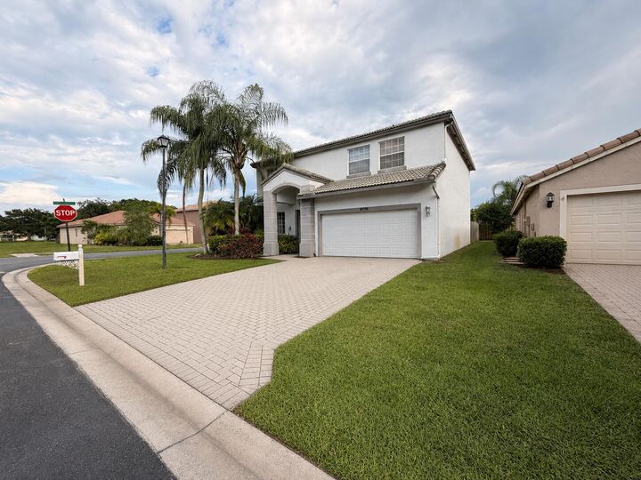 Property Photo: 10706 Hidden Bend Way FL 33414