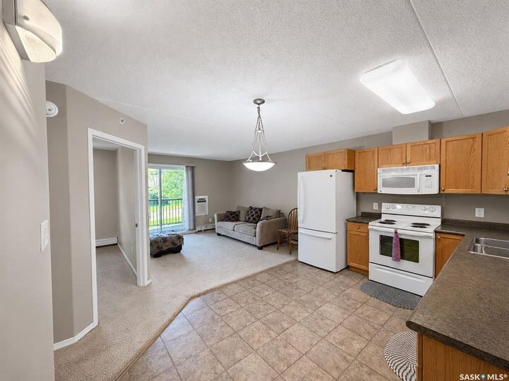 Property Photo: 1901 1 1/2 Avenue W 202 SK S6V 5A8