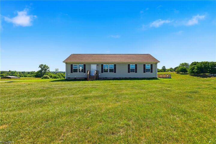 Property Photo:  112 Mining Ridge Church Road  NC 28621 