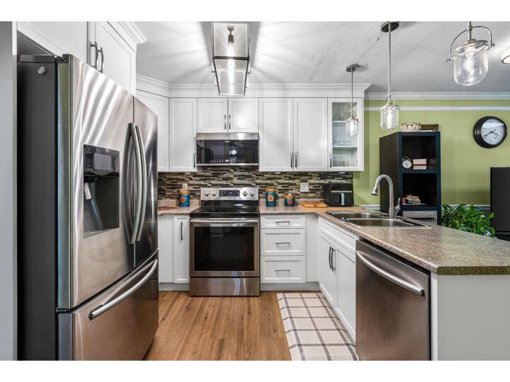 Property Photo: 33020 Maclure Road 23 BC V2S 7J6