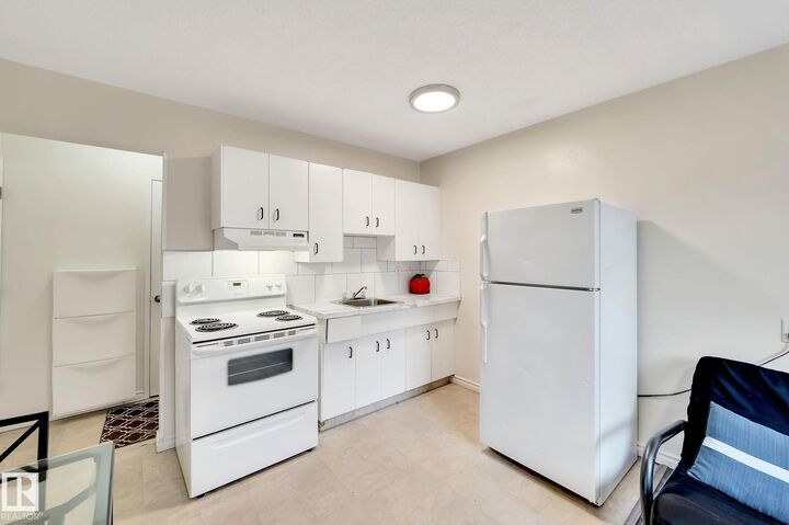Property Photo:  12409 82 Street NW 104  AB T5B 2X5 