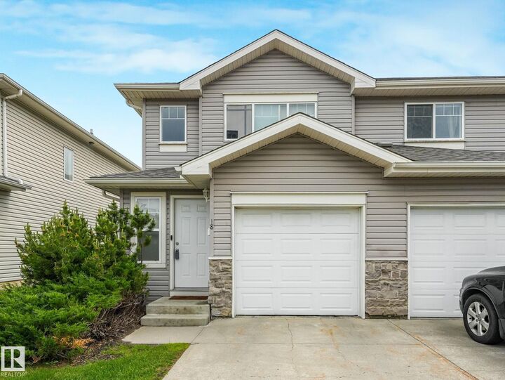 Property Photo: 230 Edwards Drive SW 18 AB T6X 1G7