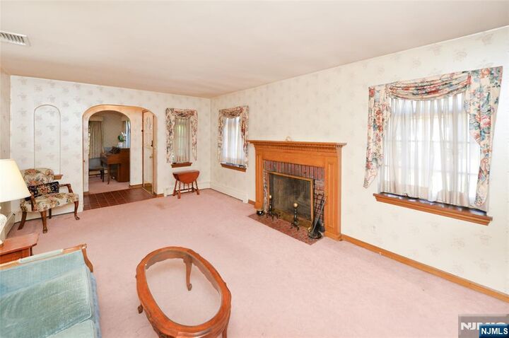 Property Photo:  15-06 Morlot Avenue  NJ 07410 