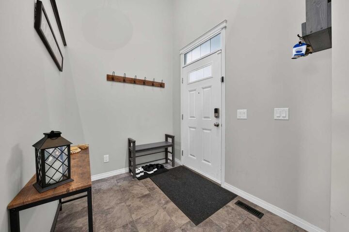 Property Photo:  665 Copperpond Boulevard SE  AB T2Z 3M4 
