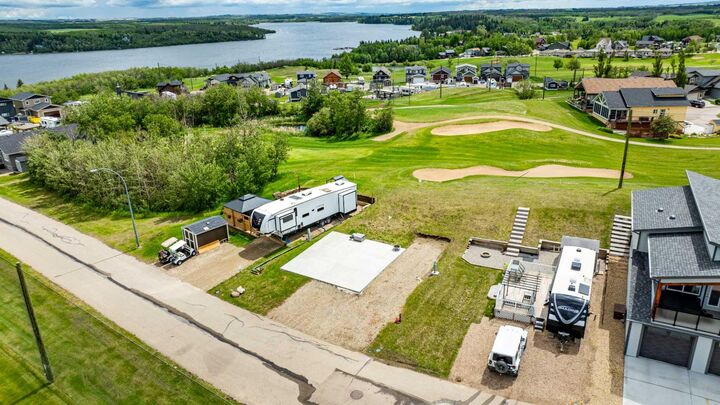 Property Photo:  25054 South Pine Lake Road 6115  AB T0M 1R0 
