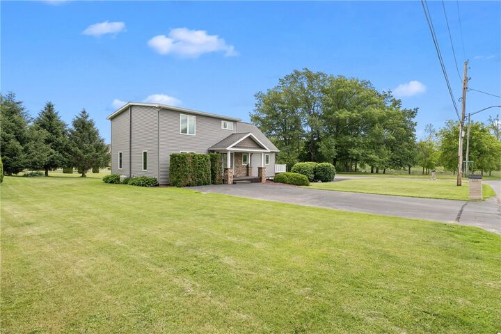Property Photo:  3013 East Avenue  NY 13165 