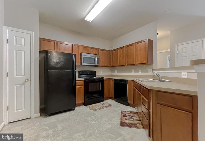 Property Photo:  23520 Fdr Boulevard 205  MD 20619 