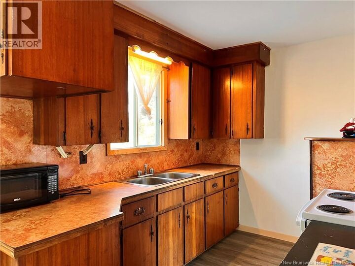 Property Photo: 2758 Sainte-Anne Road NB E2A 3Y3