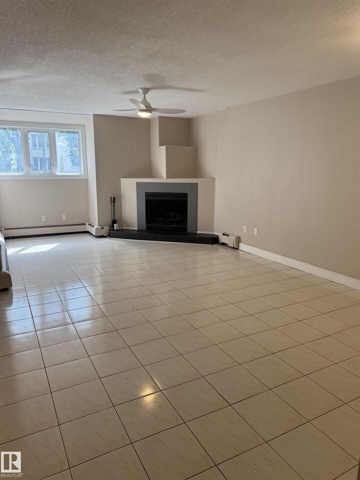 Property Photo: 10138 116 Street NW 101 AB T5K 1V8
