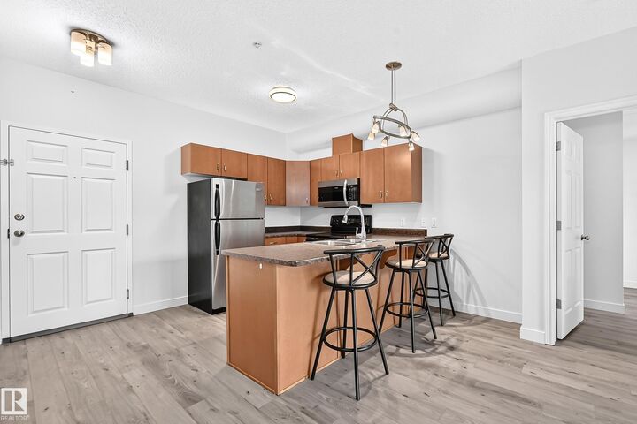 Property Photo: 10235 112 Street NW 319 AB T5K 1M7