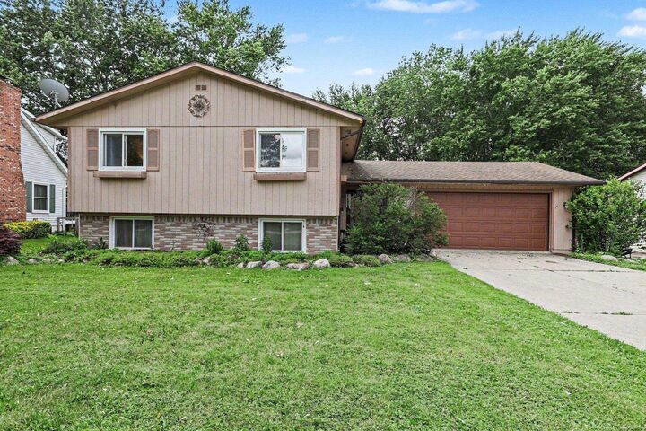 Property Photo:  302 Westwinds Drive  MI 48003 