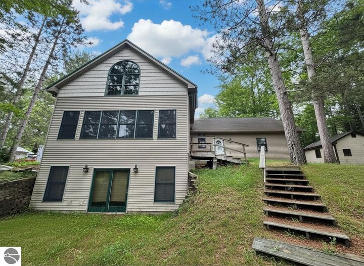 Property Photo:  4867 E Shore Drive  MI 48610 