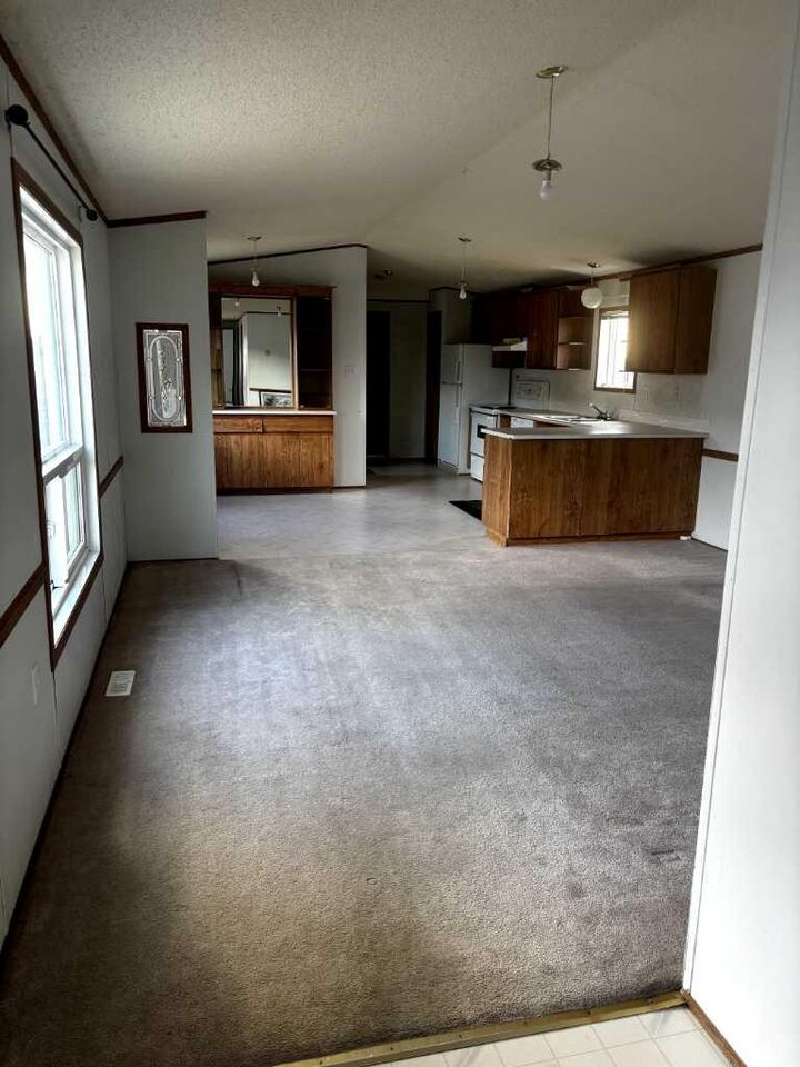 Property Photo: 39 Maple Drive AB T1R 1J2