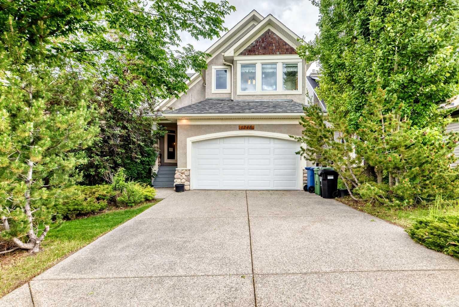 Property Photo: 1748 Hidden Creek Way NW AB T3A 6H5