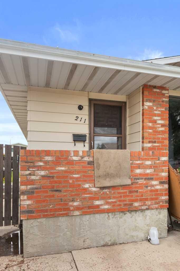 Property Photo: 211 Ross Glen Drive SE AB T1B 1N7