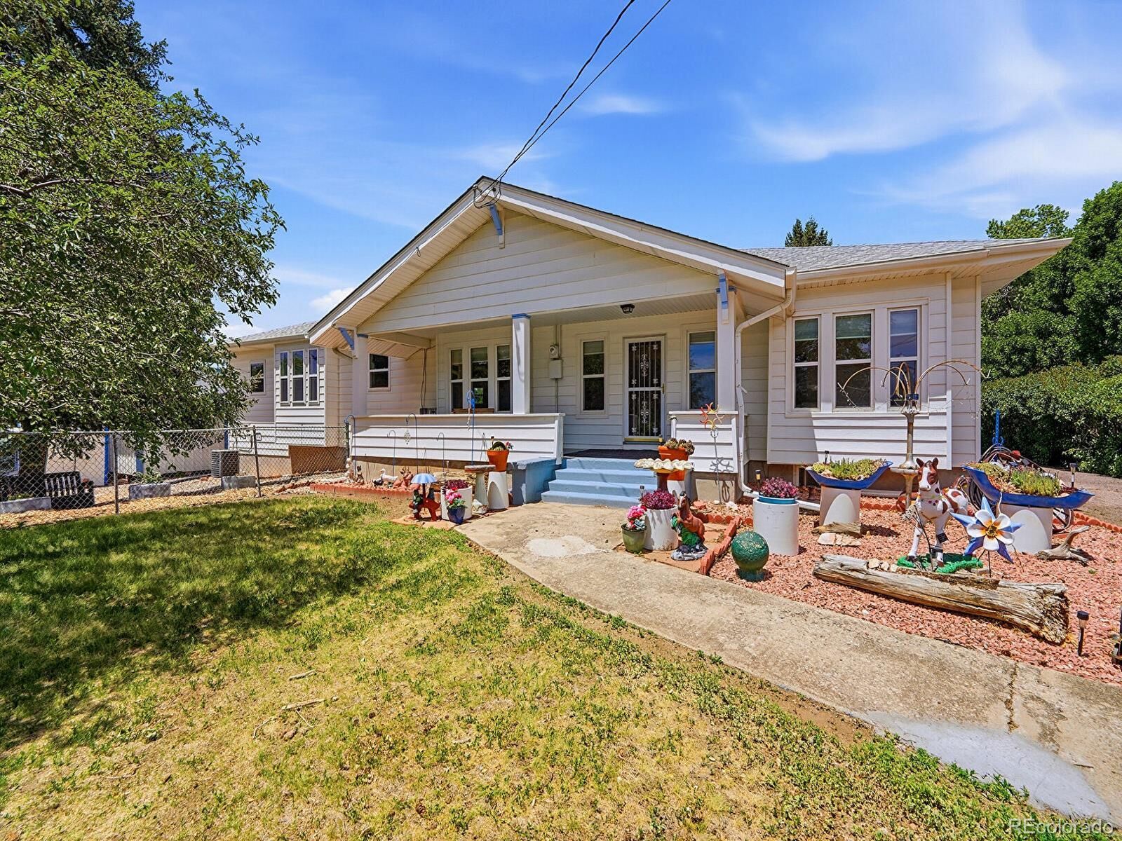 Property Photo: 14275 W 50th Avenue CO 80403