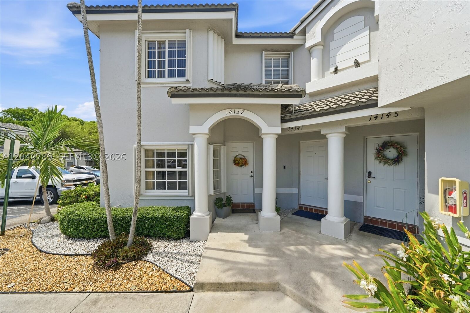 Property Photo: 14137 SW 121st Pl FL 33186