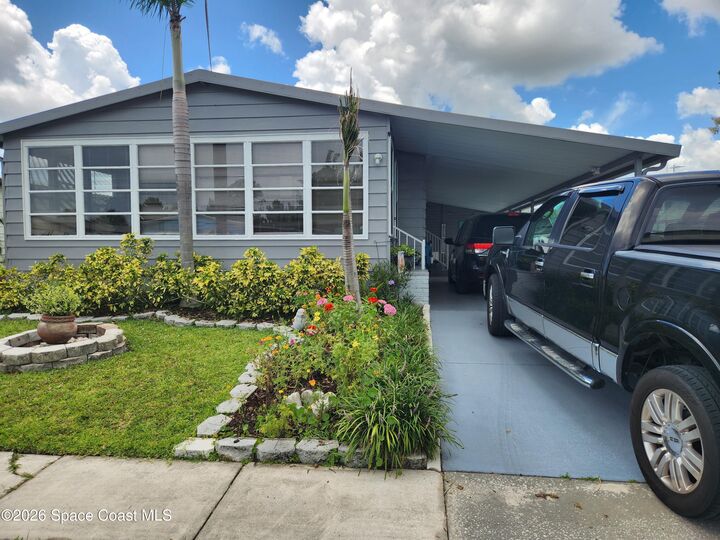 Property Photo: 2310 Coconut Palm Drive NE FL 32905