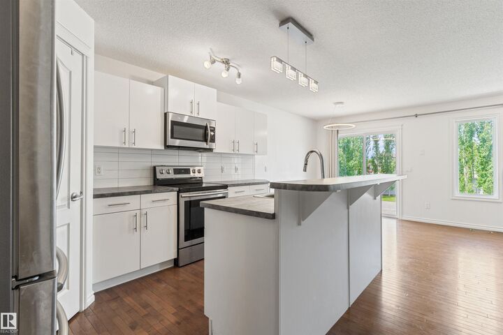 Property Photo: 17130 7A Avenue SW AB T6W 0M5
