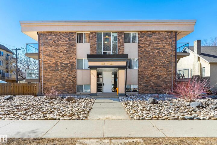 Property Photo:  10230 120 Street NW Street NW 105  AB T5K 2A3 