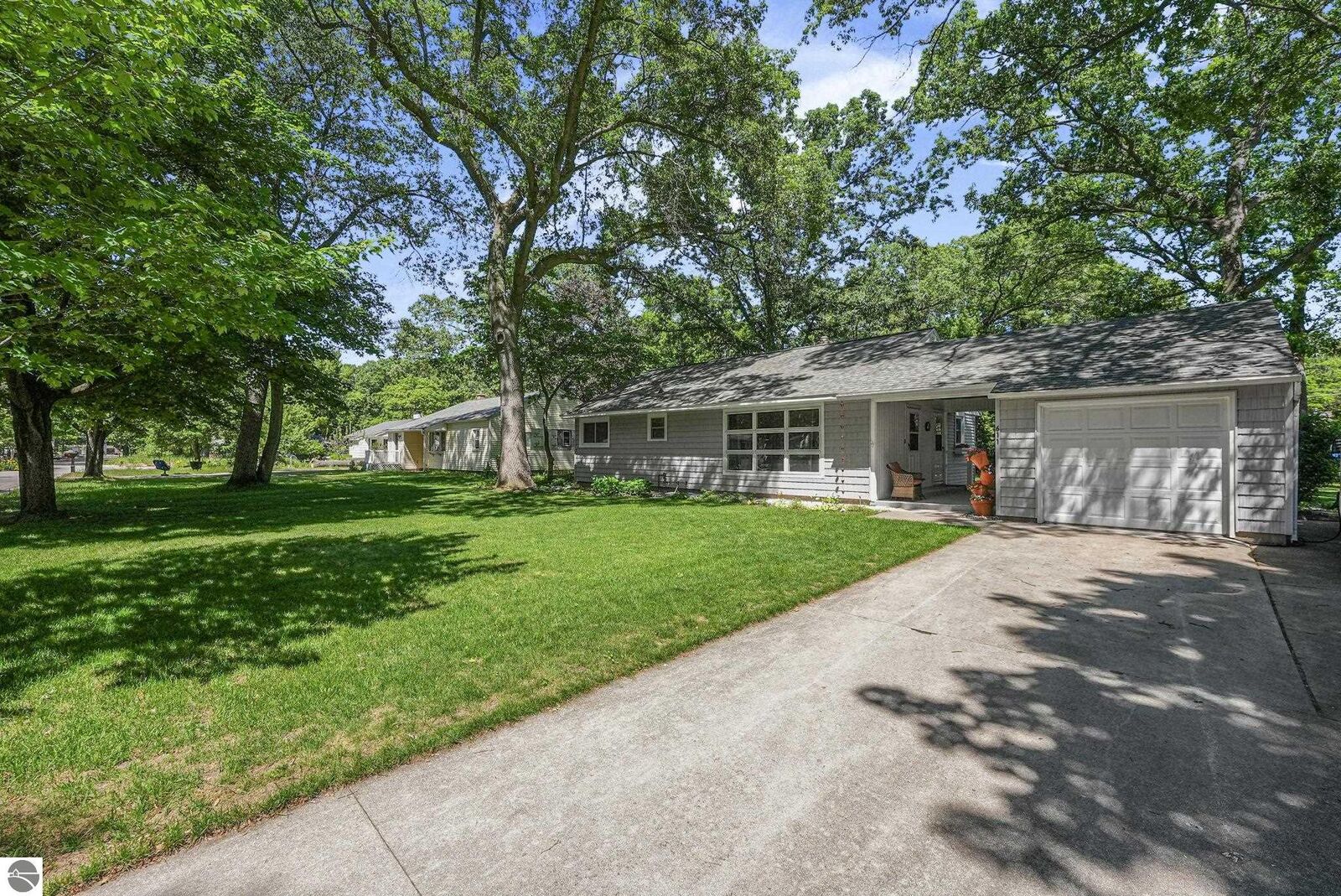 Property Photo:  611 Woodland Drive  MI 49686 