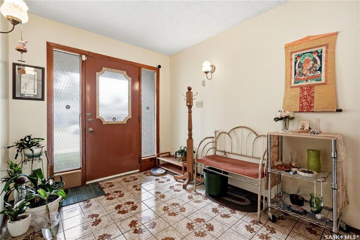 Property Photo:  211 Keeley Crescent  SK S7J 4B9 