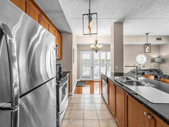 Property Photo: 1379 Costigan Road 103 ON L9T 2K6