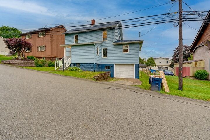 Property Photo:  1016 Walnut St  PA 15636 